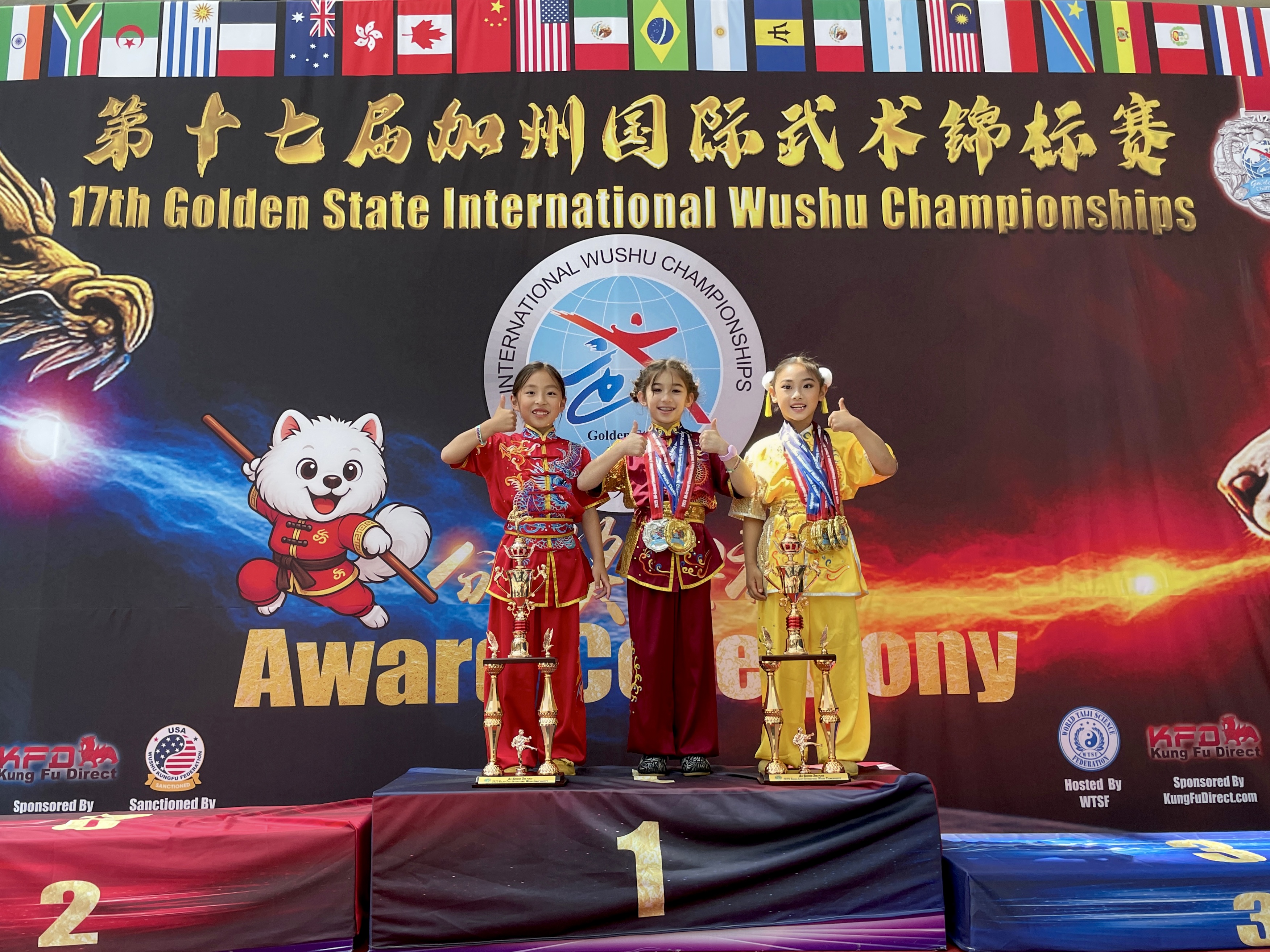 Three young students on podium at 17th Golden State International Wushu Championships