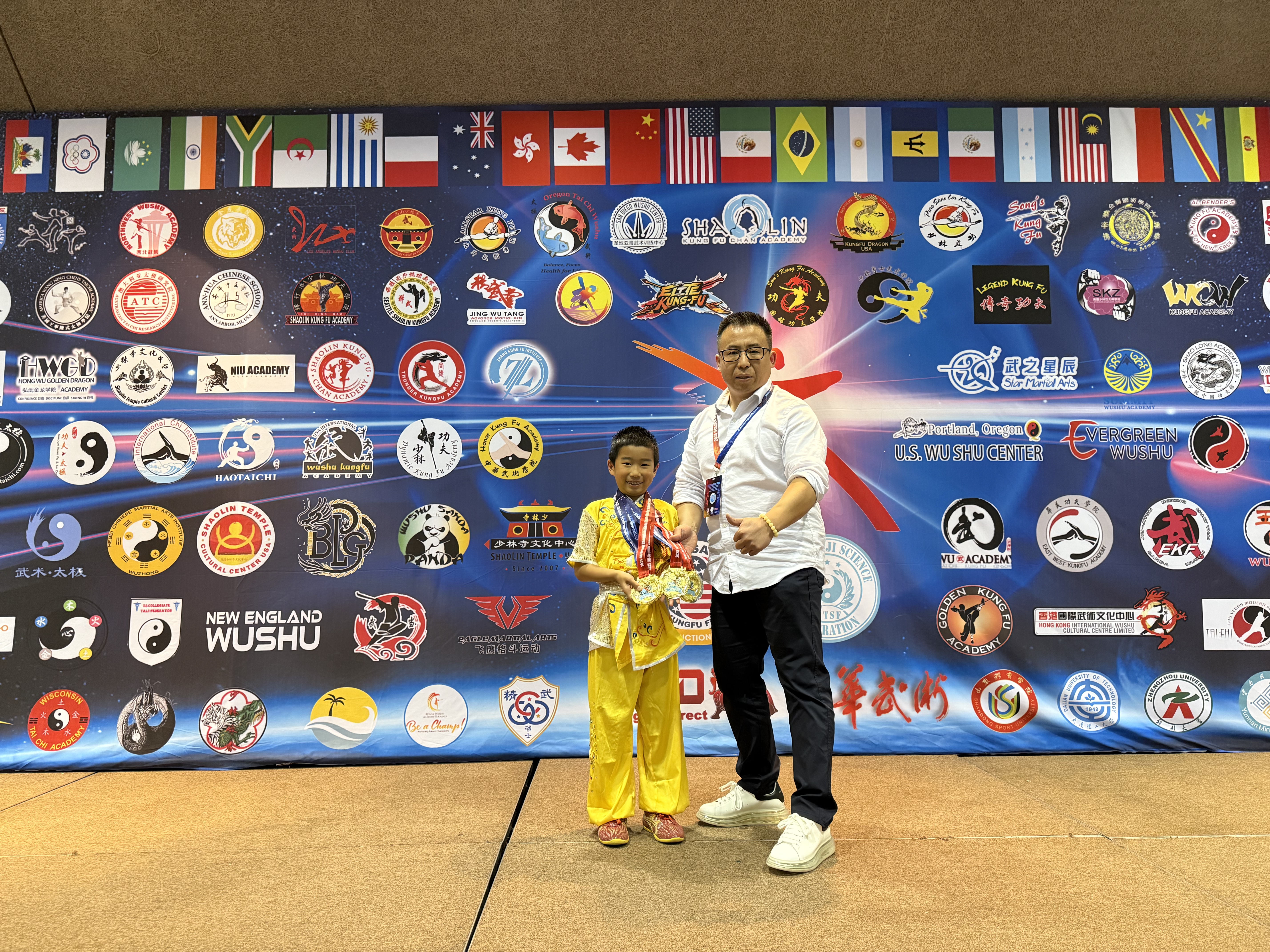 Young champion and coach at national competition