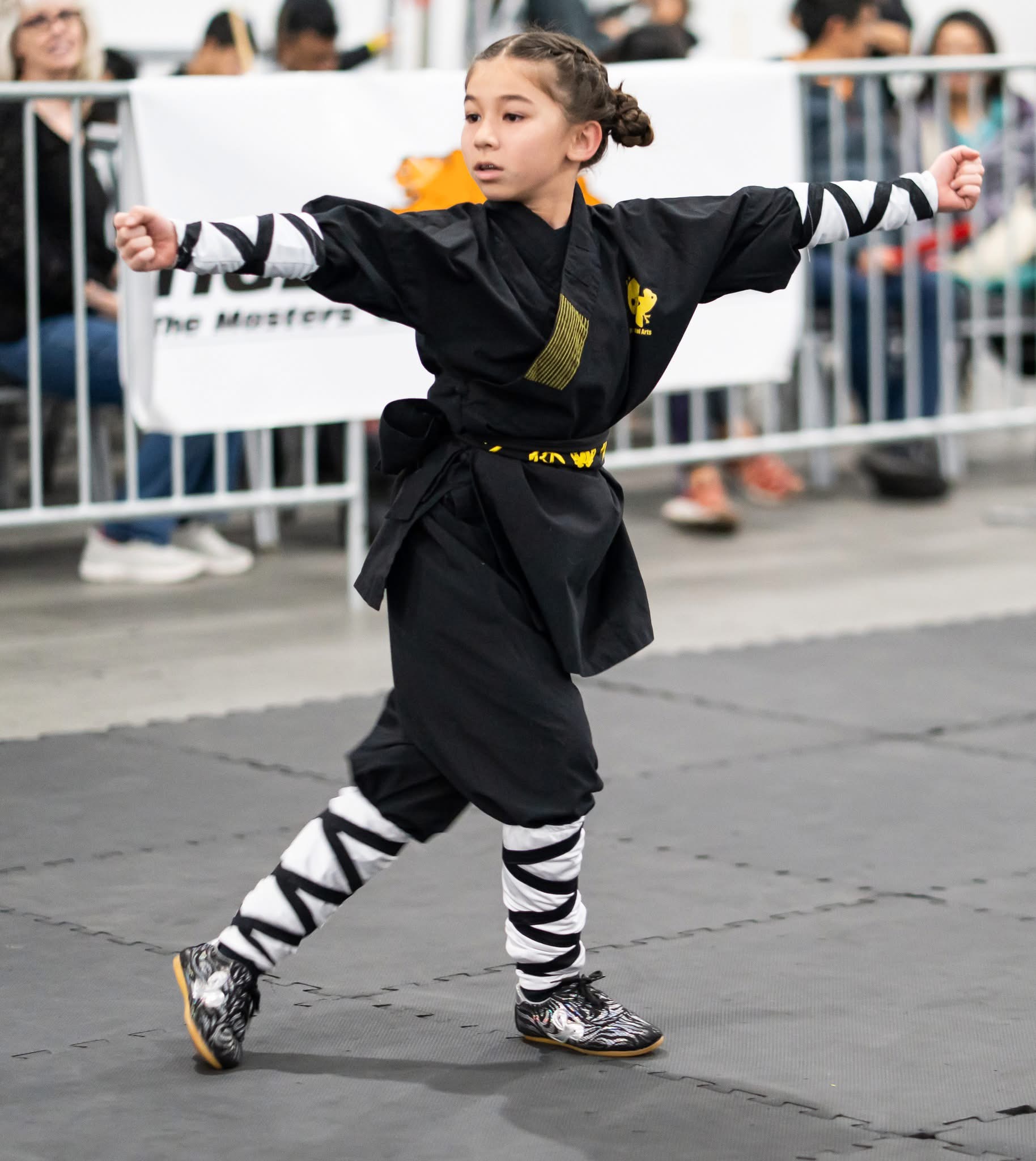 Student performing Shaolin forms at competition